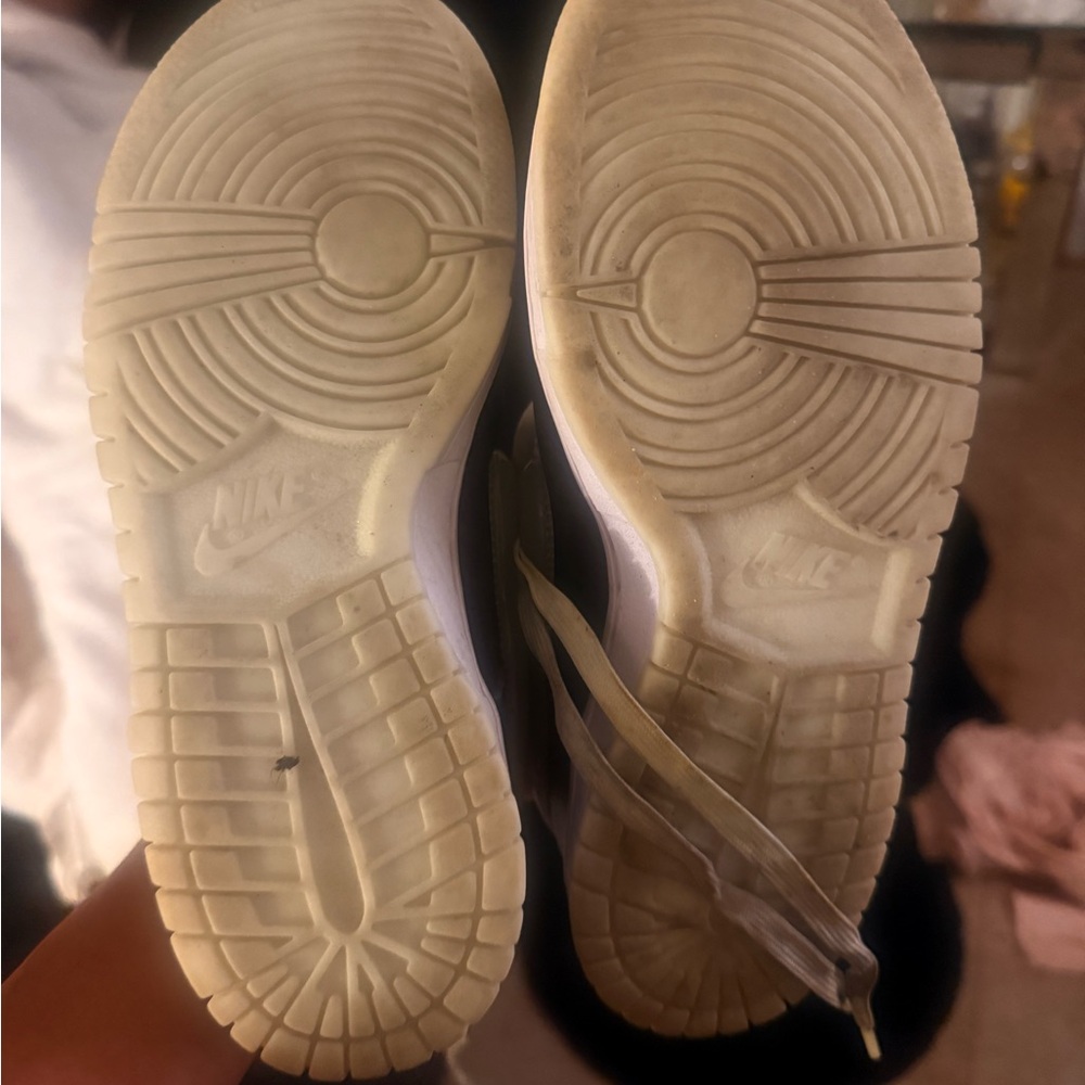 Nike Sneakers with White Soles